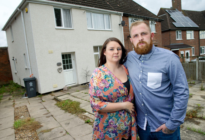 Ashley Gamble, 28,and his partner Sophia, who have fled from their home with their two children, including a three week old daughter, after it was invaded by around 150 of the most deadly spiders in the world who arrived on a banana from Asda and hatched out in their kitchen.The family were advised to move out by a pest control company and are living at Ashleys parents house. See story by Andrew Parker.