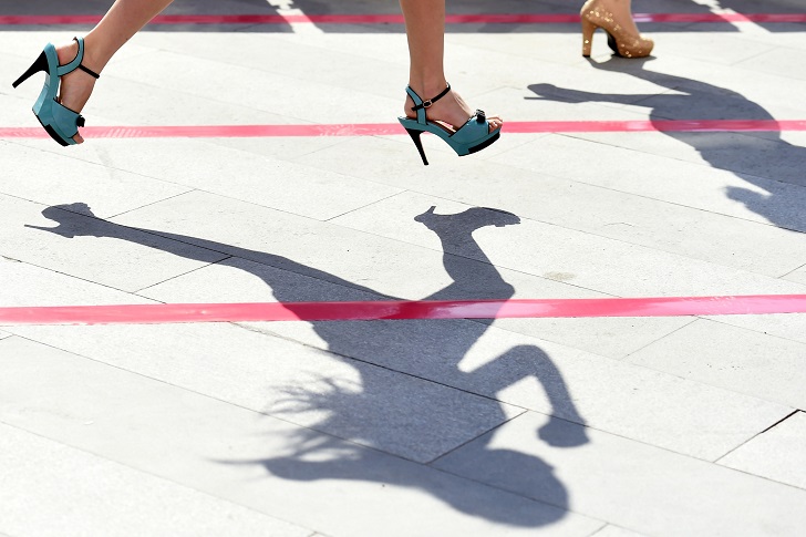 TAIYUAN, July 4, 2015 Participants run during a ''High Heels Race'' in Taiyuan, capital of north China's Shanxi Province, July 3, 2015. Participants had to run 50 meters in 10-centimeter high heels in the race. (Credit Image: ZUMAPRESS.com/Global Look Press)