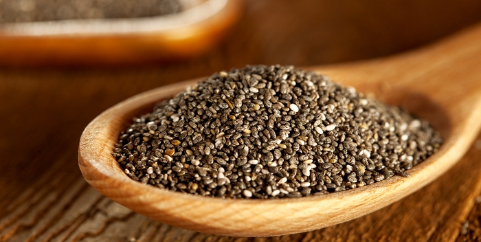 Organic Dry Black and White Chia Seeds against a background
